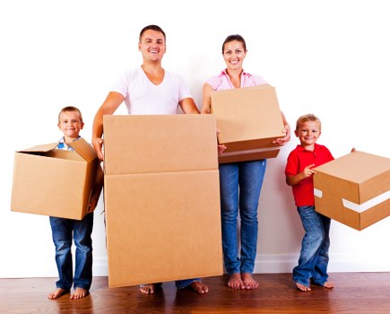 Removal team preparing furniture with safety equipment in Shoreditch