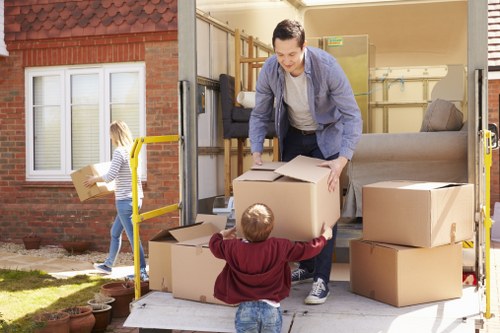 Professional house removals in Shoreditch with moving van and packed boxes
