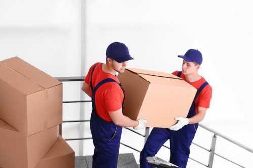 Removal team packing boxes for a Shoreditch apartment move