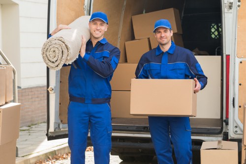 Professional movers packing household boxes in Shoreditch