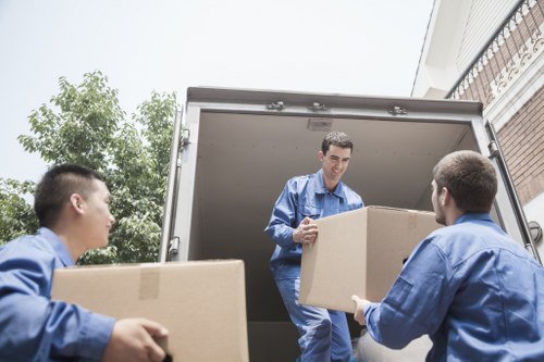 Shoreditch man and van transporting boxes and furniture