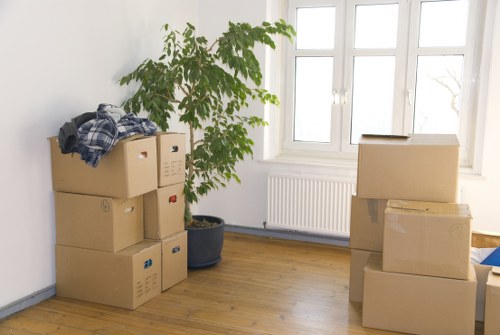 Customer and removals provider reviewing service terms before the move