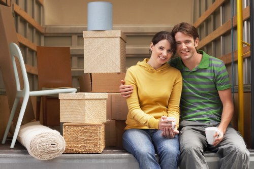 House removals Shoreditch packing supplies and labelled boxes in a new home