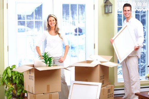 Careful loading of furniture and boxes for house removals in Shoreditch